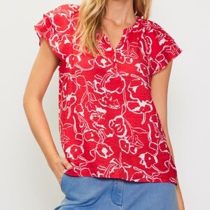 New with tags. Red ruffle sleeve top. Skies are Blue
